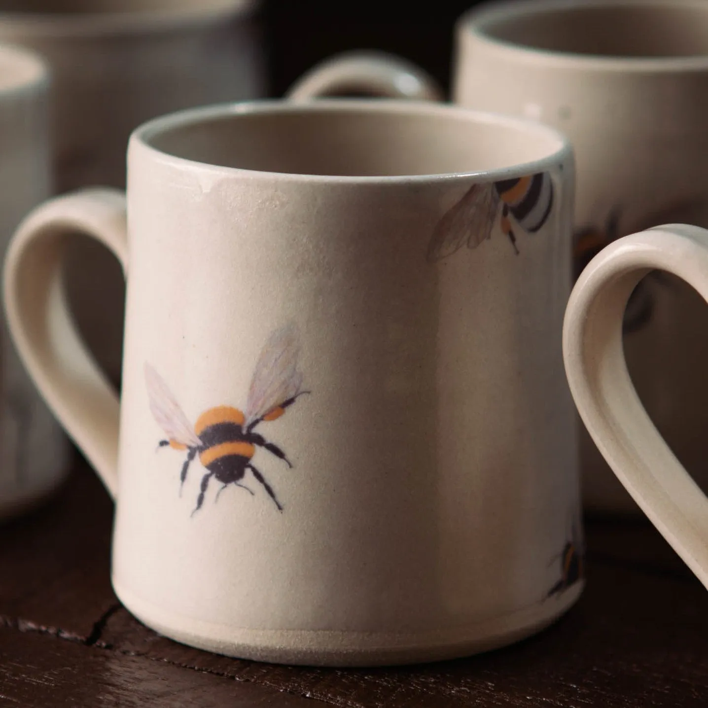 Sustainably Handcrafted Irish Pottery Mugs of Wildflower, Tree and Honey-Bee Artwork