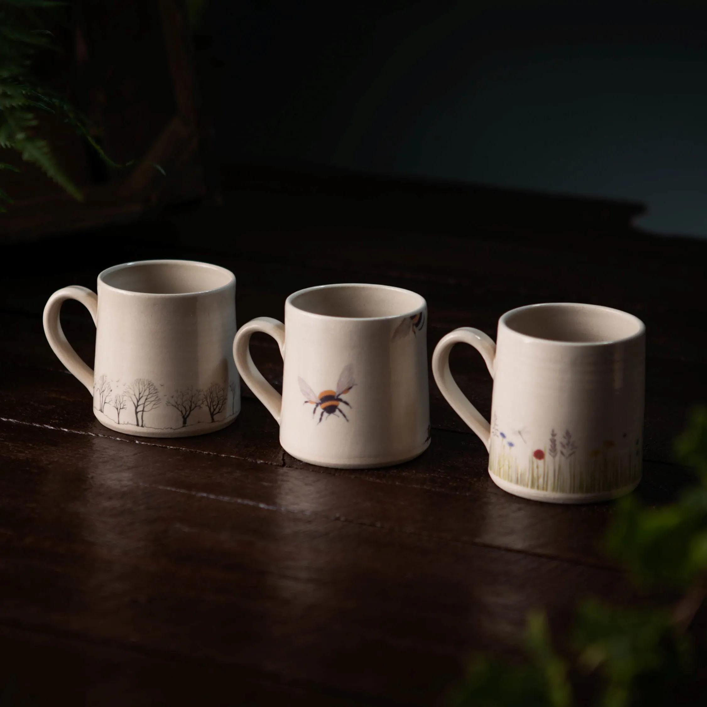 Sustainably Handcrafted Irish Pottery Mugs of Wildflower, Tree and Honey-Bee Artwork