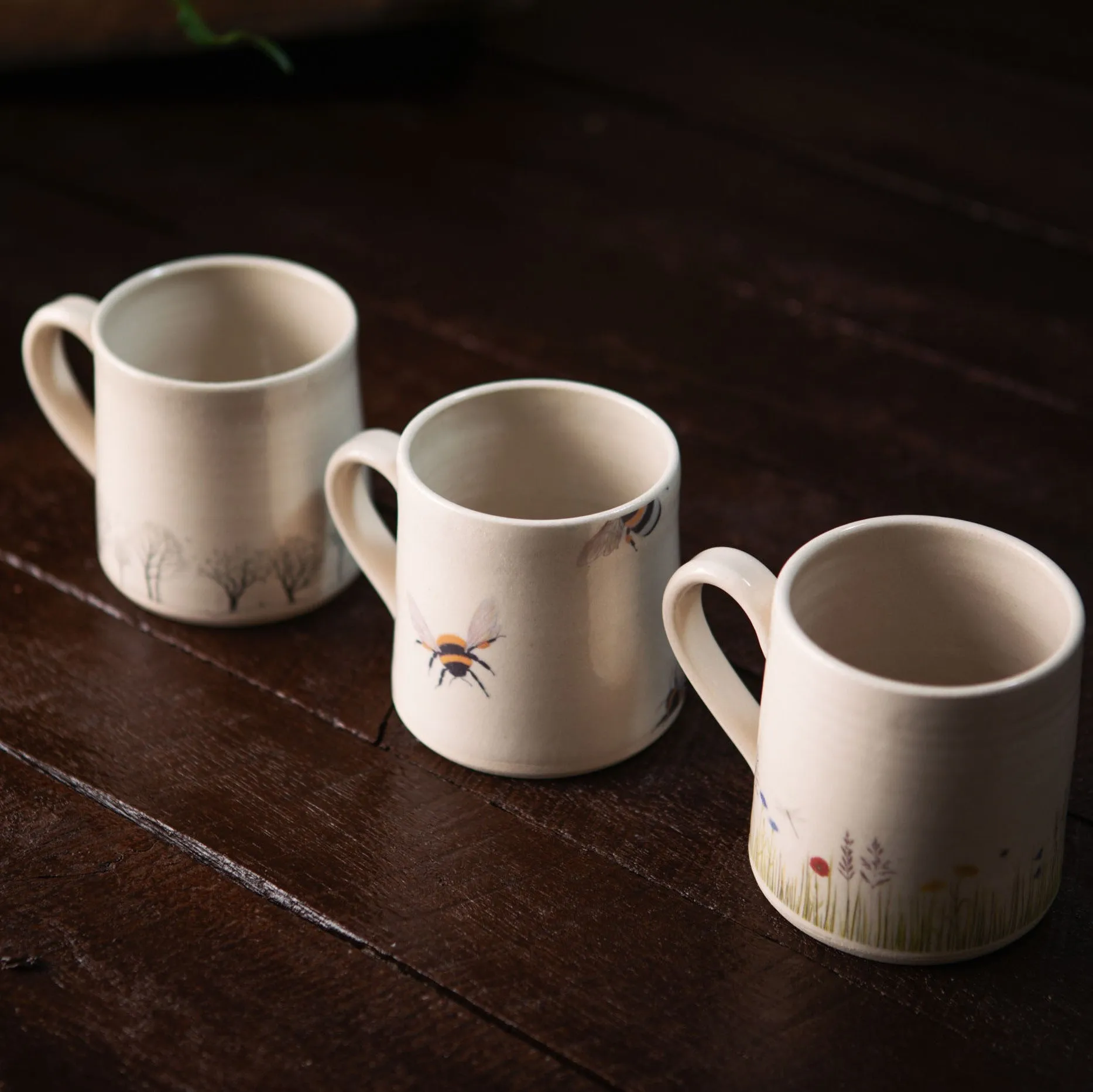 Sustainably Handcrafted Irish Pottery Mugs of Wildflower, Tree and Honey-Bee Artwork